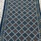 Hand-woven blue hallway rug in natural wool