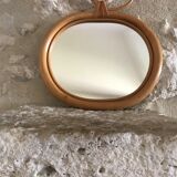 Wicker mirror in the shape of an apple