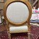 Large cabriolet armchair in Louis XVI style with gilded wood.