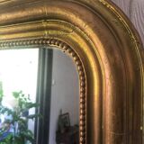 Ancient mirror with moulded frame and bead frieze 59x80cm