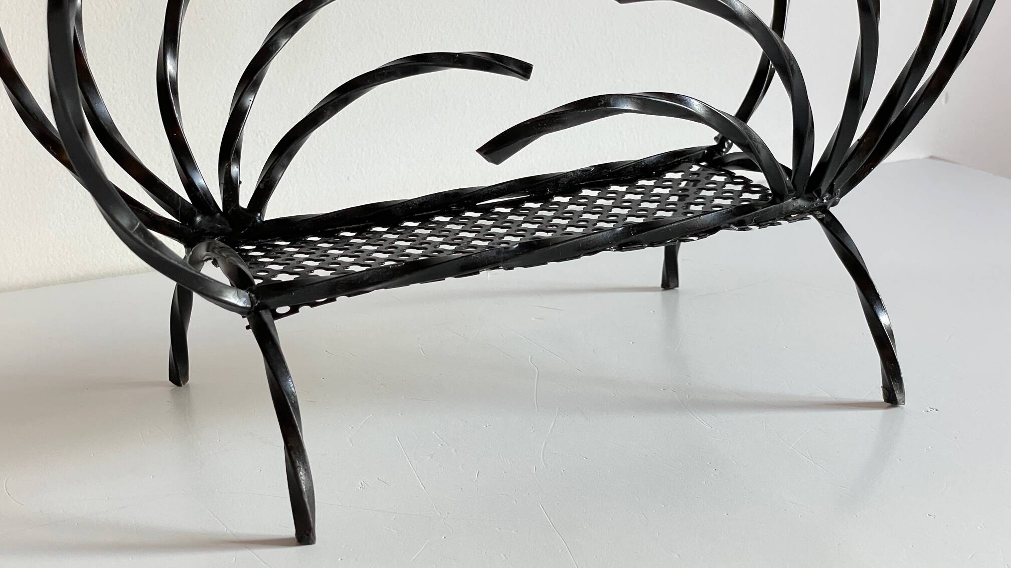Vintage steel and rigitulle magazine holder