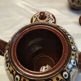 Combination of a teapot and a milk pot