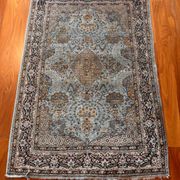 Antique Ghoum carpet from Iran in silk.