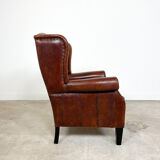 Vintage sheep leather wingback armchair by Lounge Atelier