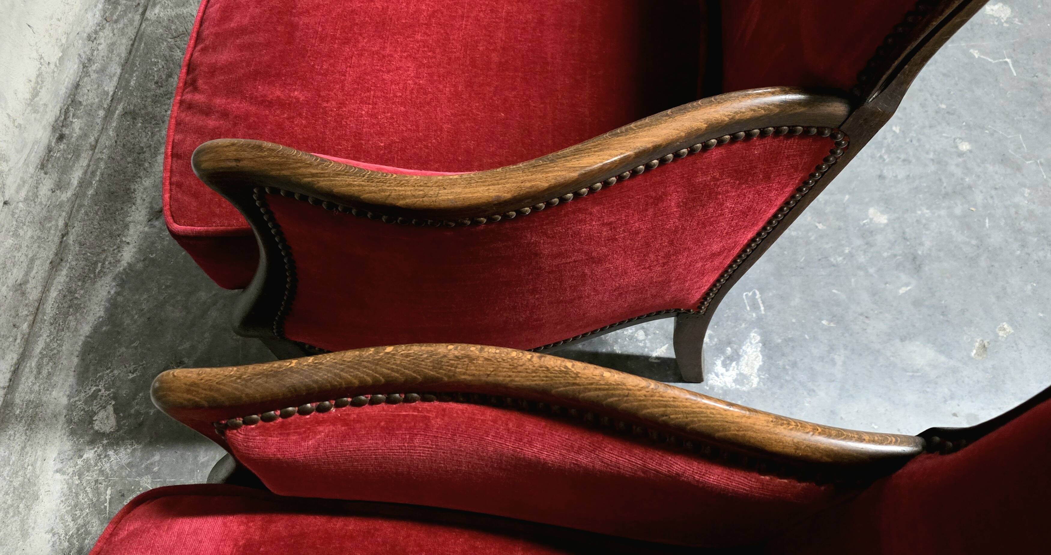 Pair of Louis XV style bergère armchairs in red velvet.