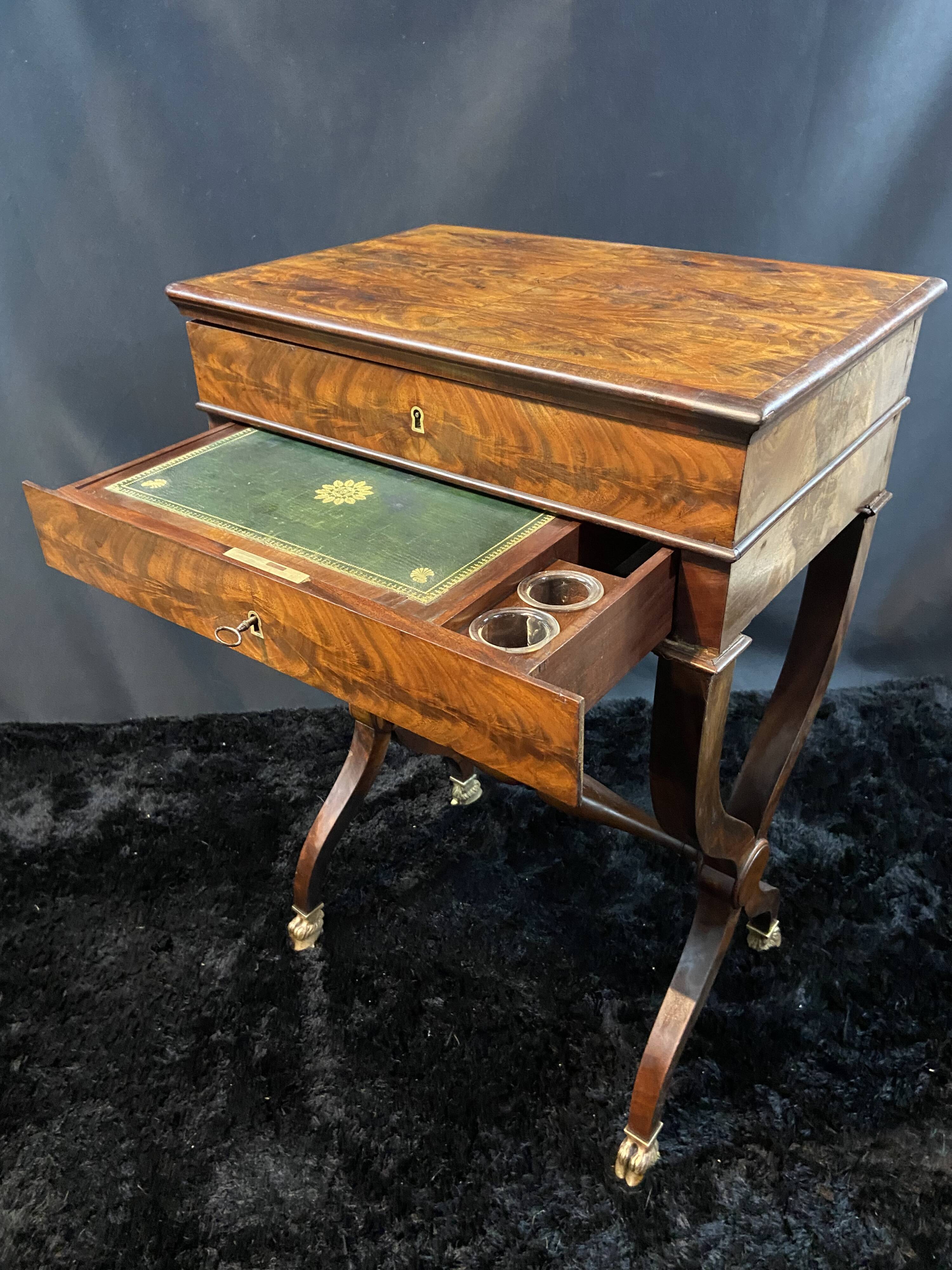 Louis-Philippe period mahogany writing desk with candlestick, 19th century
