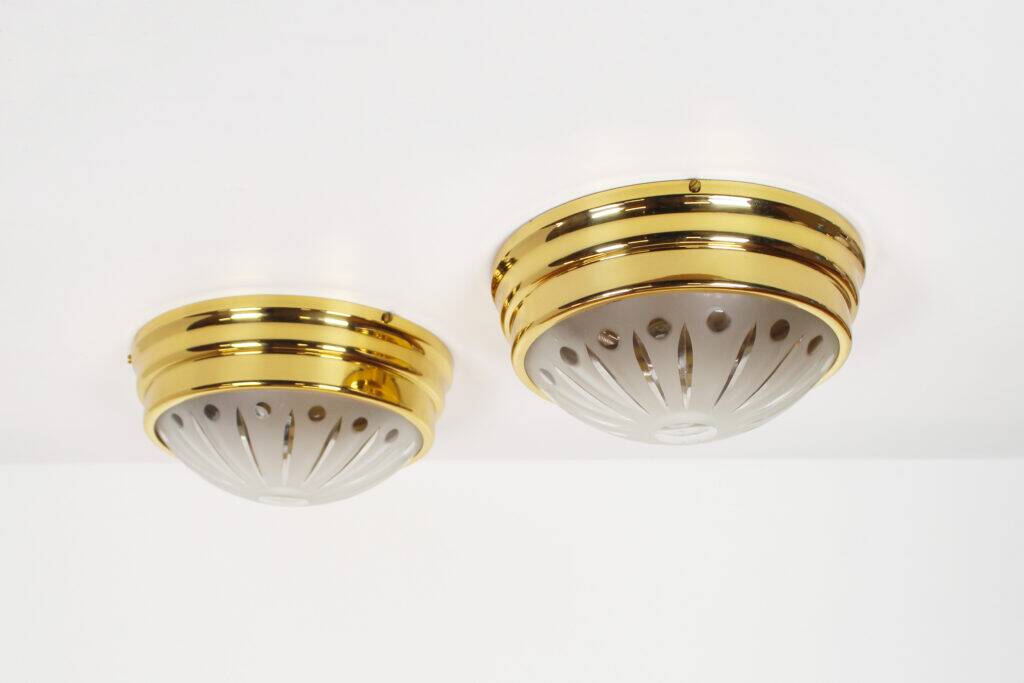 Pair of vintage brass ceiling lights with glass globe