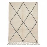 Moroccan Berber rug with black diamond patterns