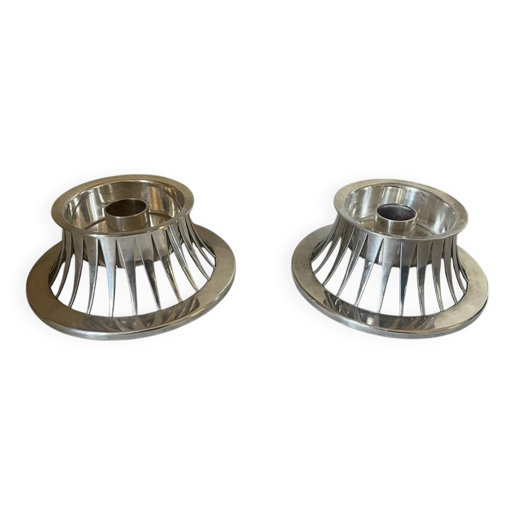 Pair of Keltum Pleet silver metal candlesticks