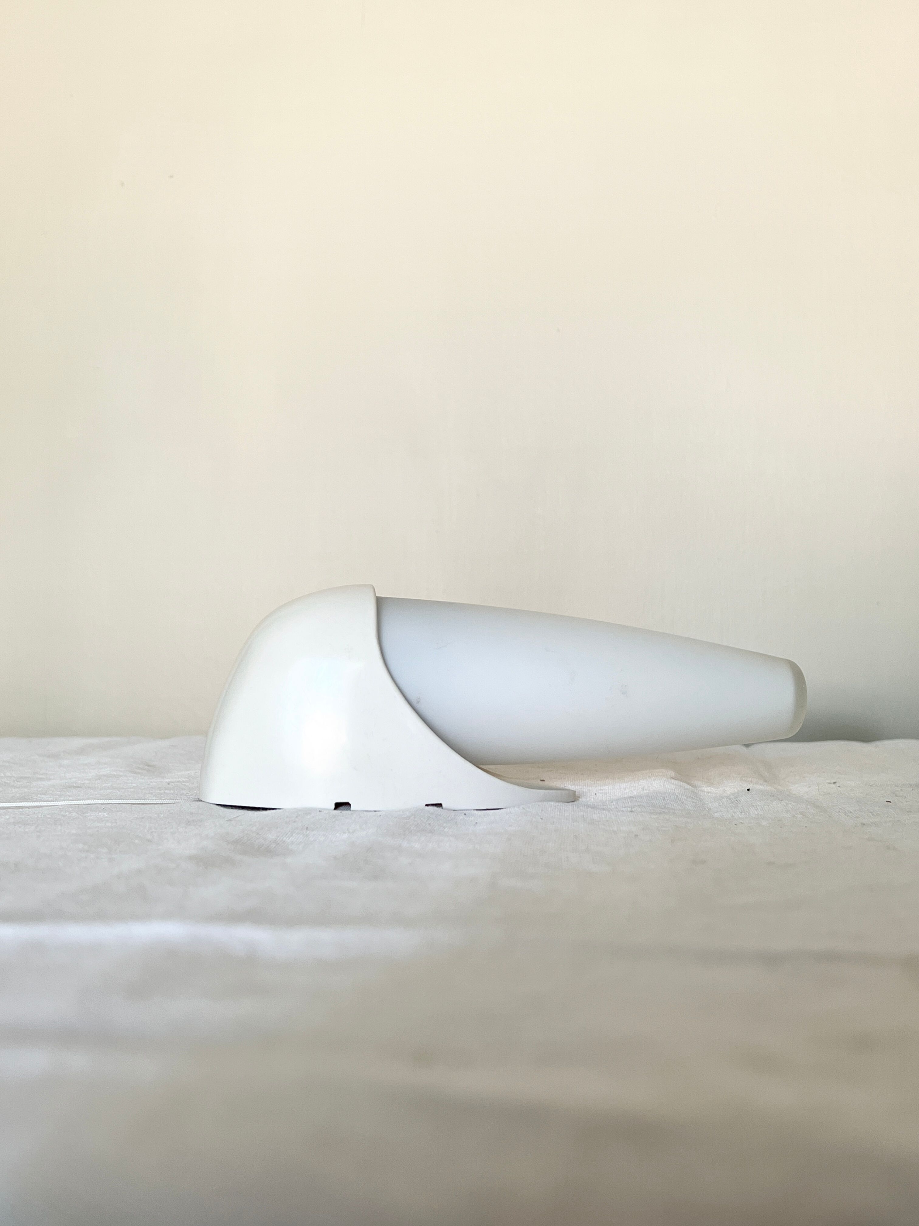 Set of two Small mid-century bakelite & glass wall lamps by Bo Niko Belgium, 1960s