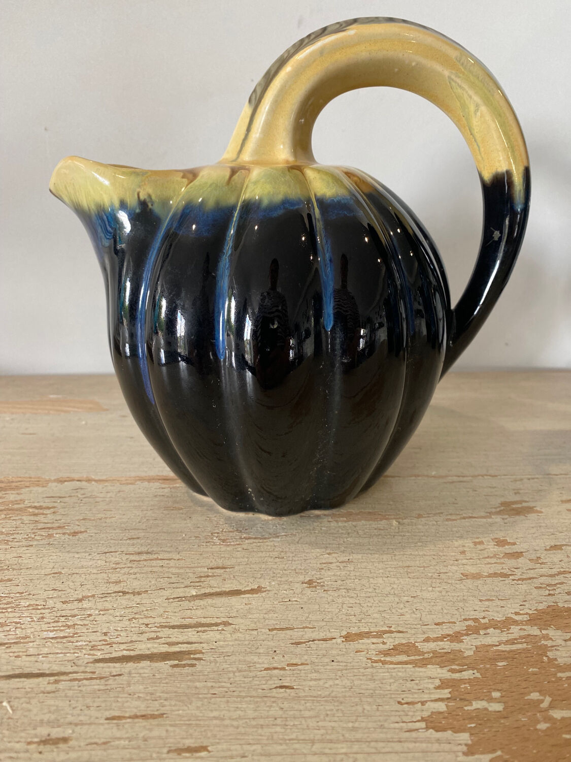 Bowler pitcher handle deported