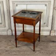 Refreshment table in mahogany, grey marble top, two zinc buckets, 18th century.