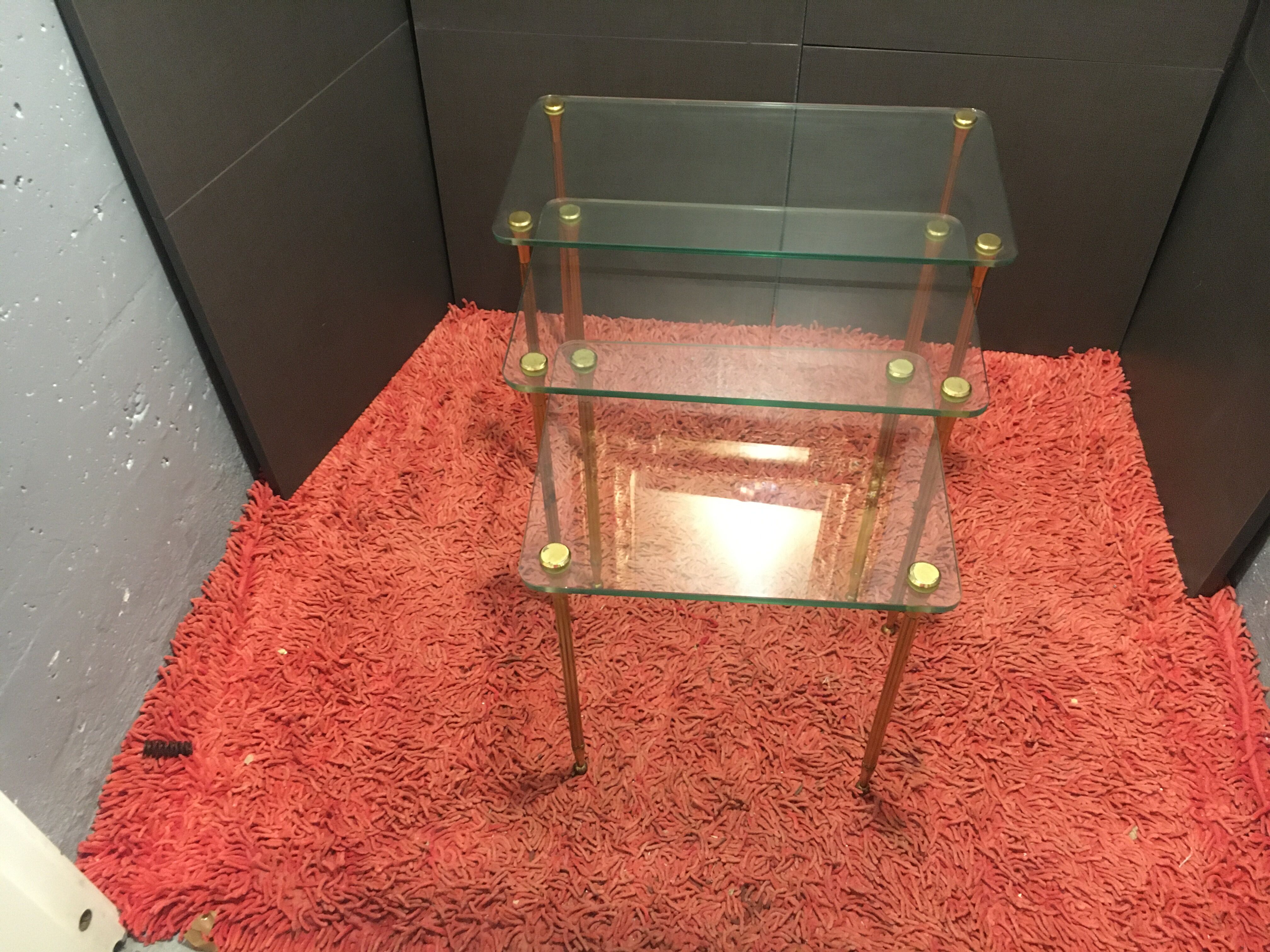 Brass and glass trundle tables
