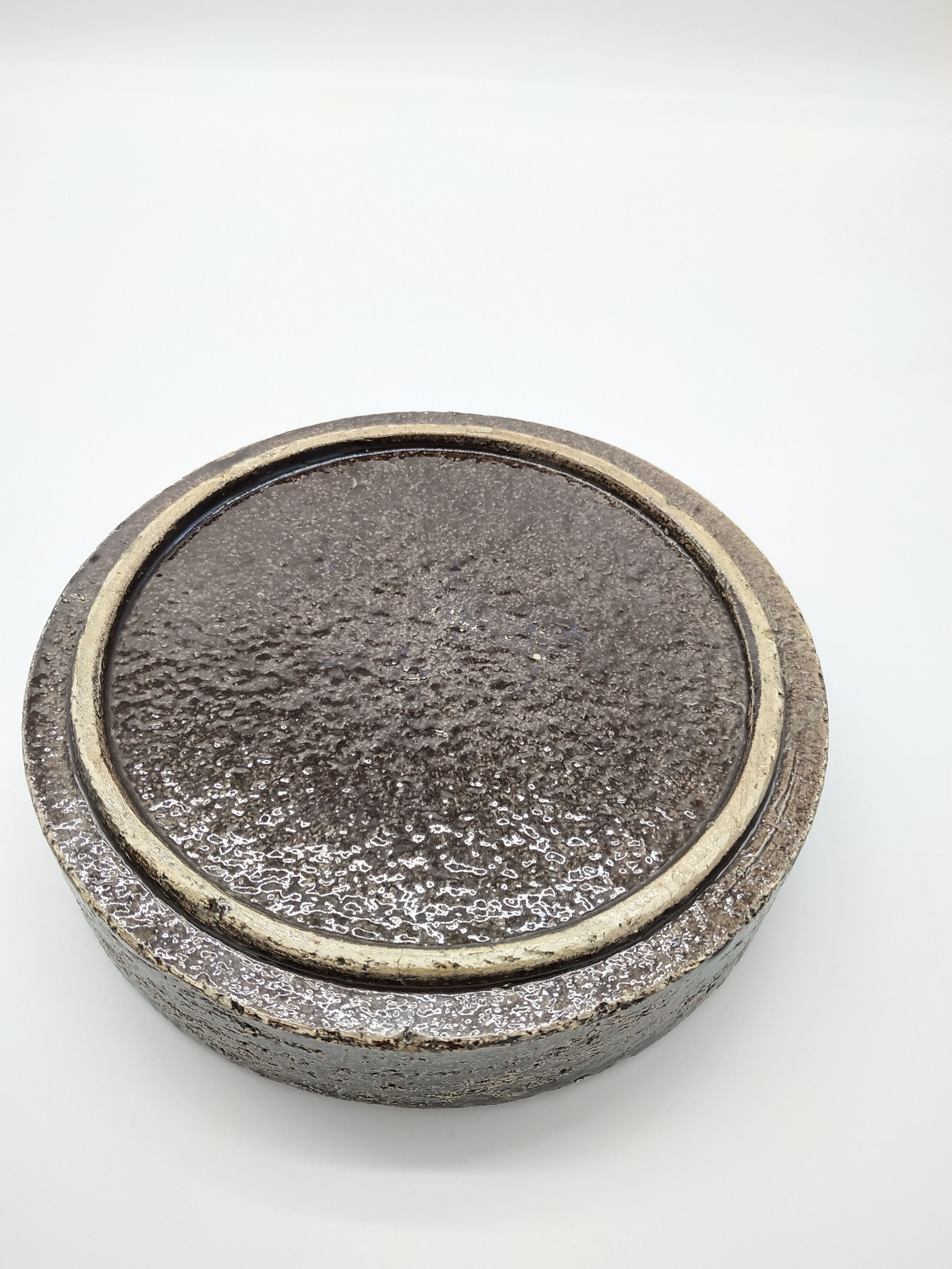 Brutalist cut in orange and red enamelled sandstone