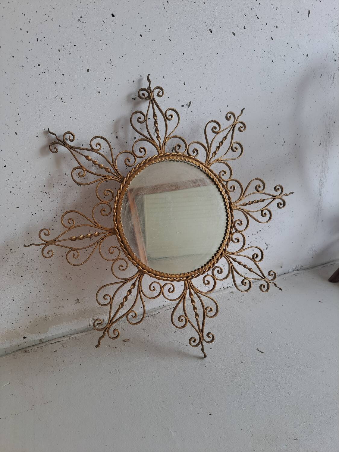 Vintage gold metal sun mirror