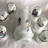 Pitcher orange service and 6 bubbled and opalescent puffed milky glasses