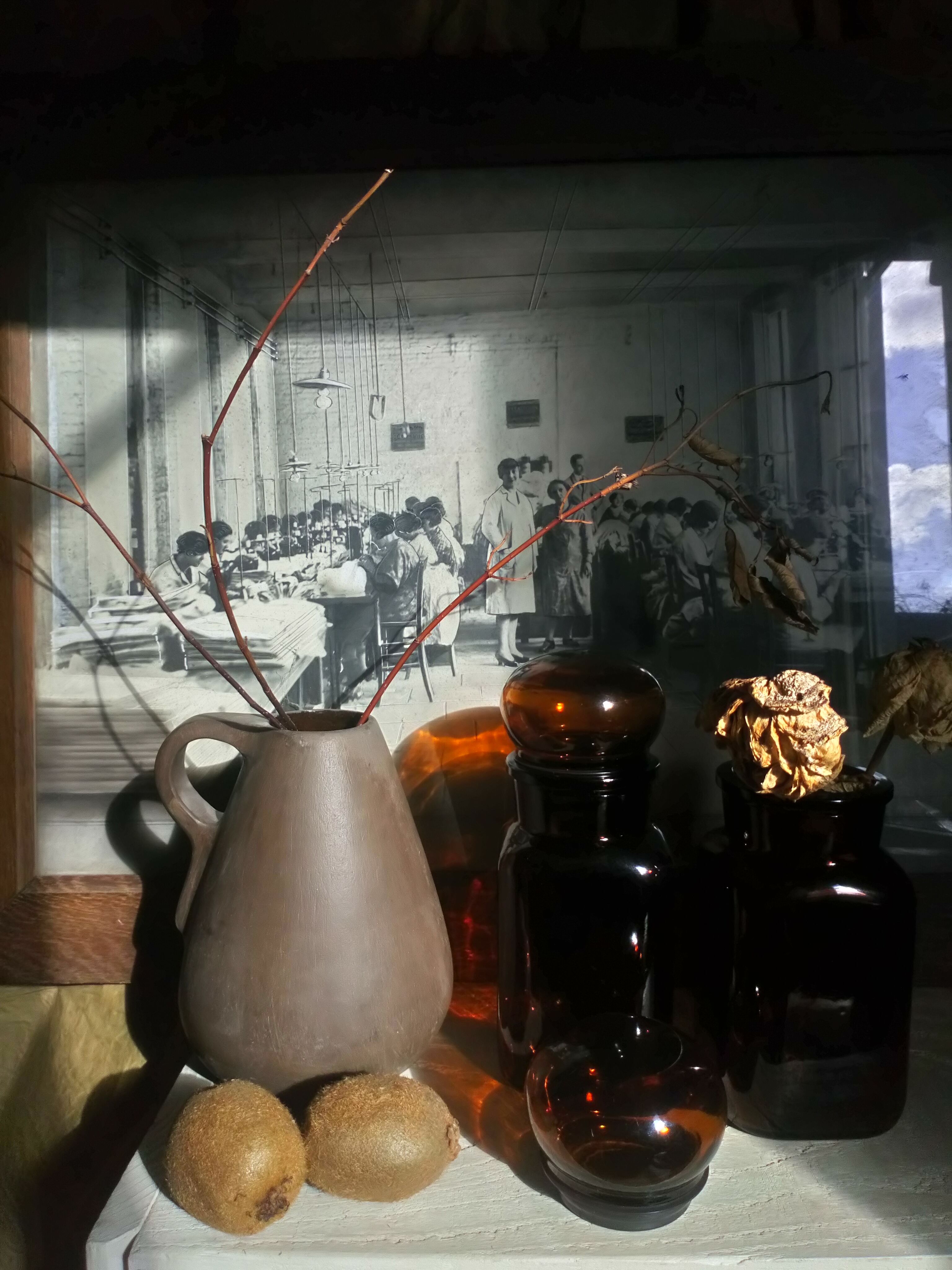 Duo of vintage apothecary bottles in amber glass