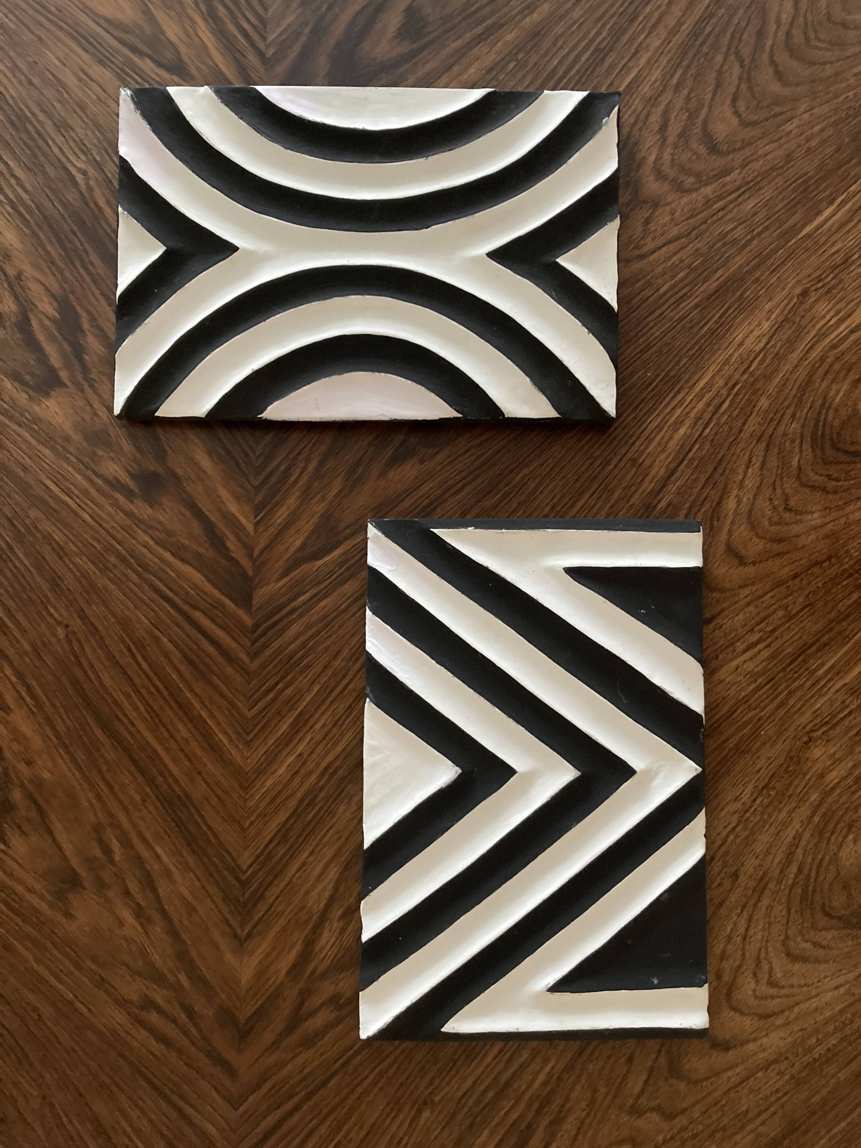 Two Imigongo paintings / panels traditional art from Rwanda