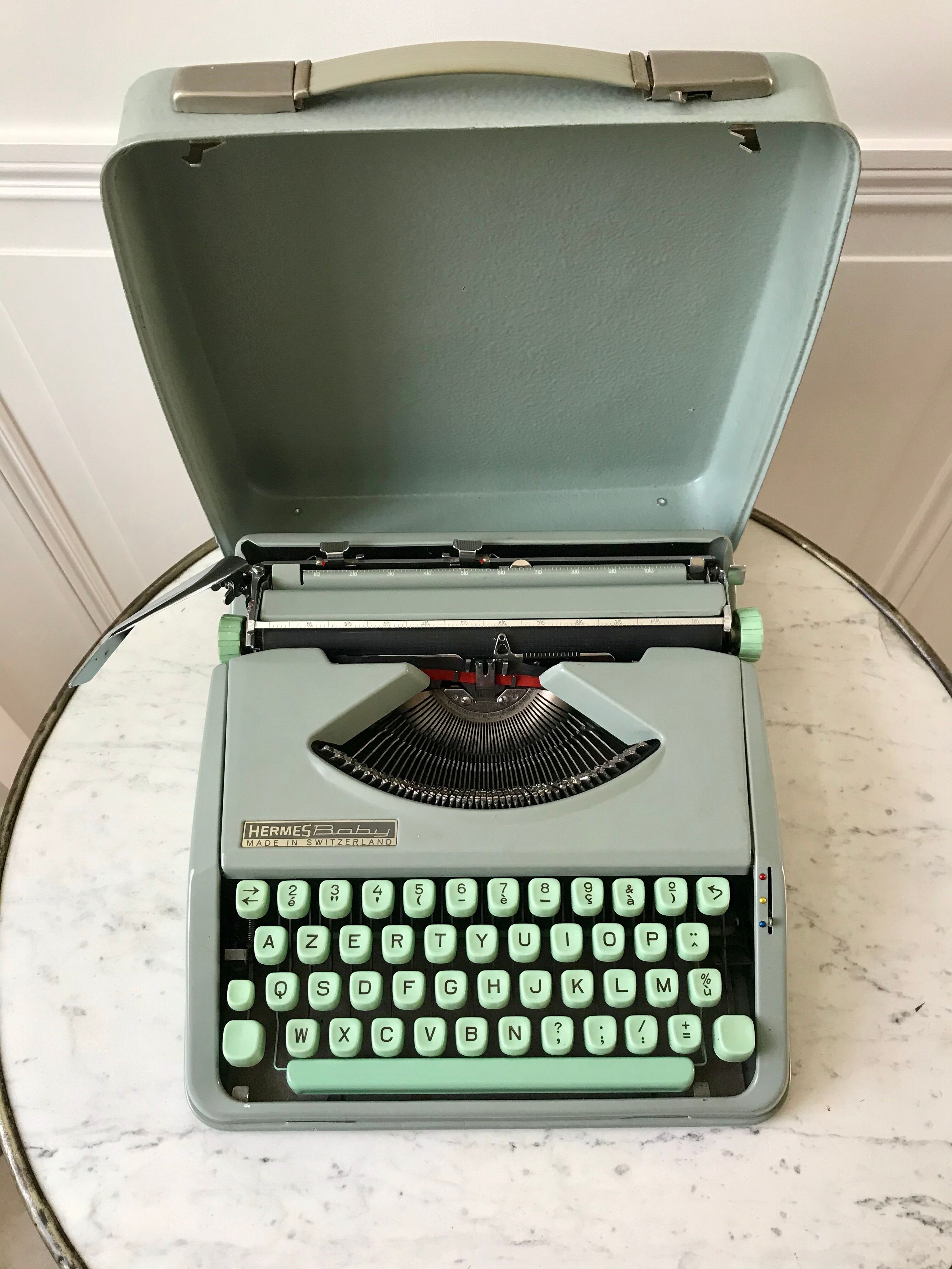 Mint green typewriter hermes baby made in switzerland