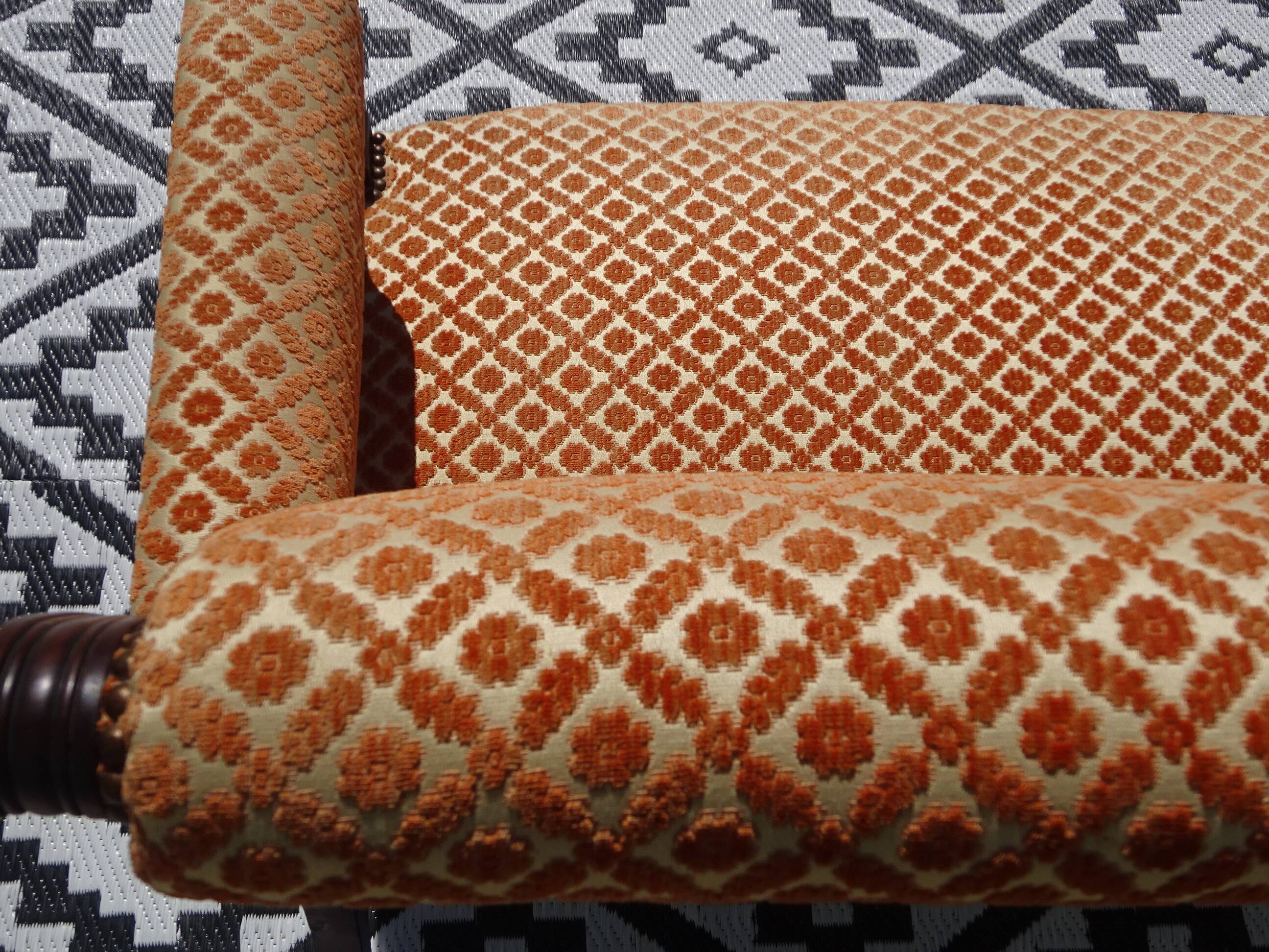 Vintage bench in wood and orange/ivory velvet.