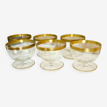 Series of 6 glasses, bowls on curved legs, raised in fine crystal and gilding
