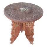 Old small carved wooden table