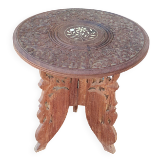 Old small carved wooden table