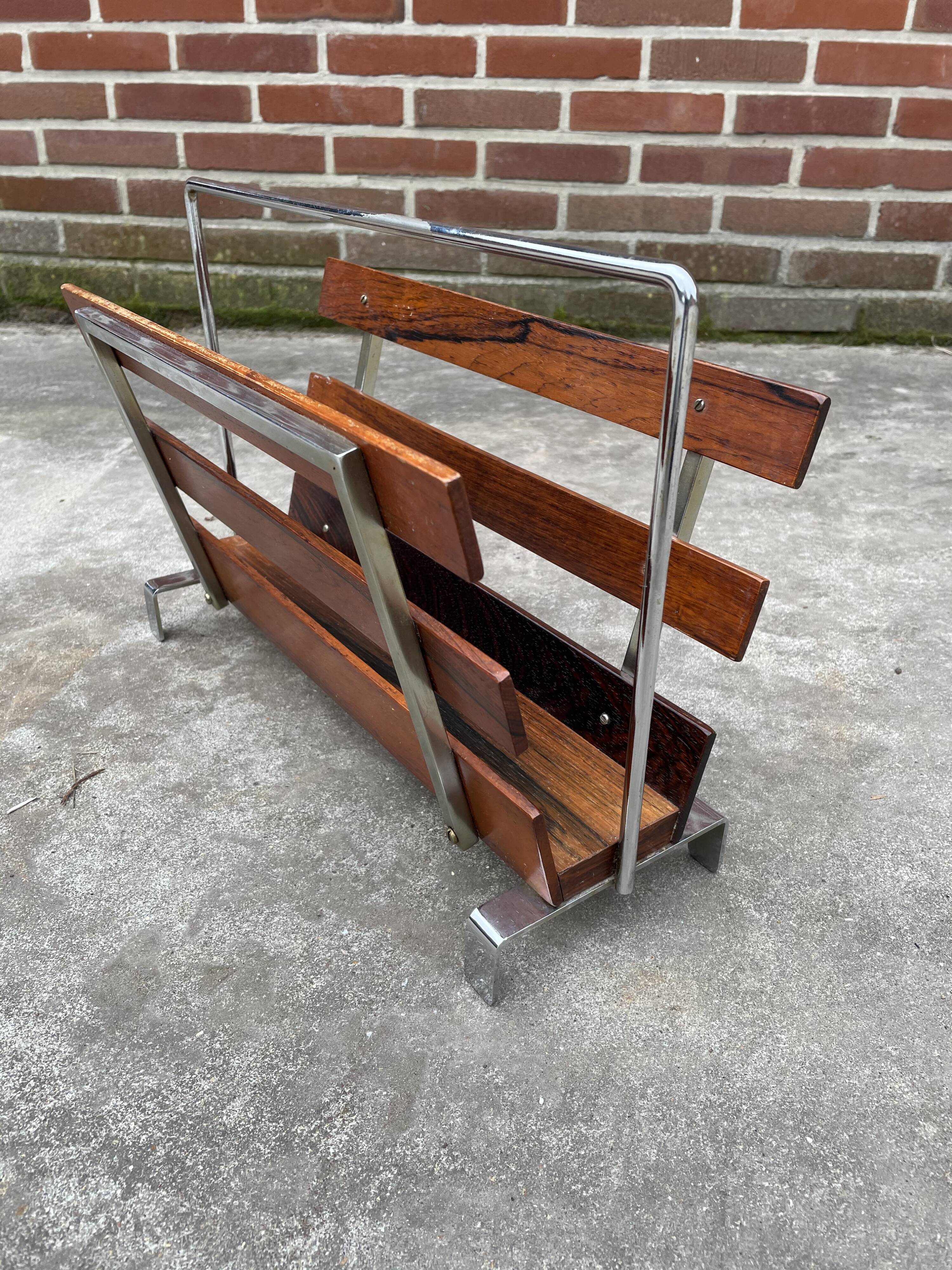 Vintage magazine rack from  rosewood and chrome design