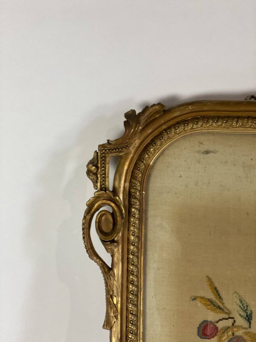 Cross-stitch tapestry in a Louis XVI style frame from around 1900.