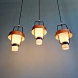 Trio of Scandinavian pendant lights in opaline and copper metal, 1960s
