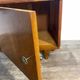 Small wooden piece of furniture with a marble top, 1950s.