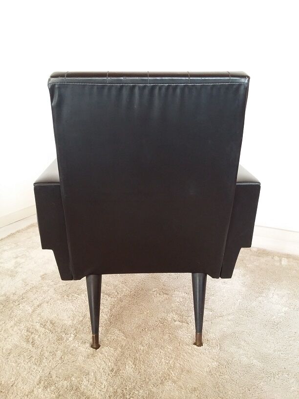 Black armchair of the 1950s