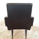 Black armchair of the 1950s