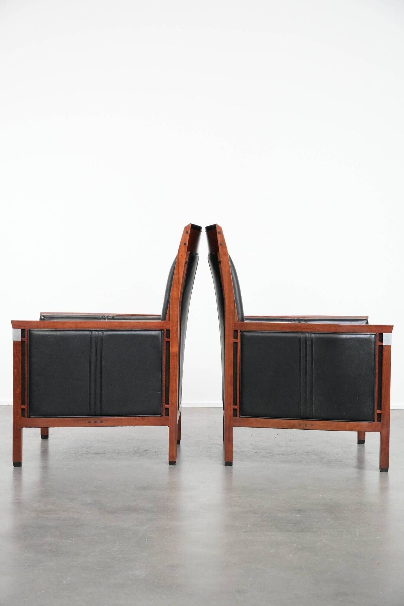 Beautiful set of 2 black cow leather Art Deco design armchairs with high back