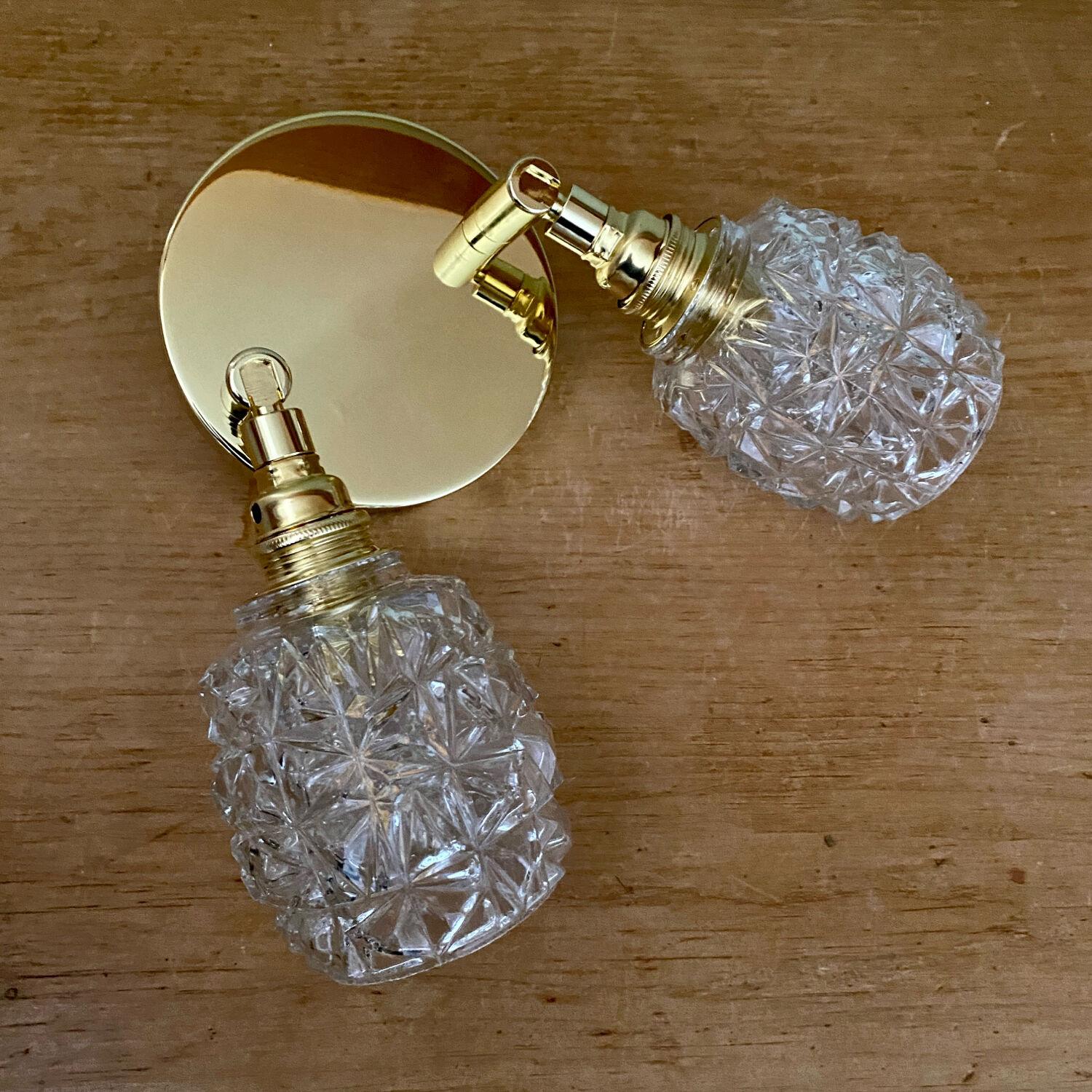Double vintage tulip wall light in moulded glass.