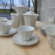 Coffee maker and cups