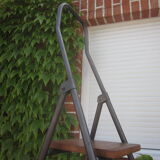 Old stepladder in metal and wood