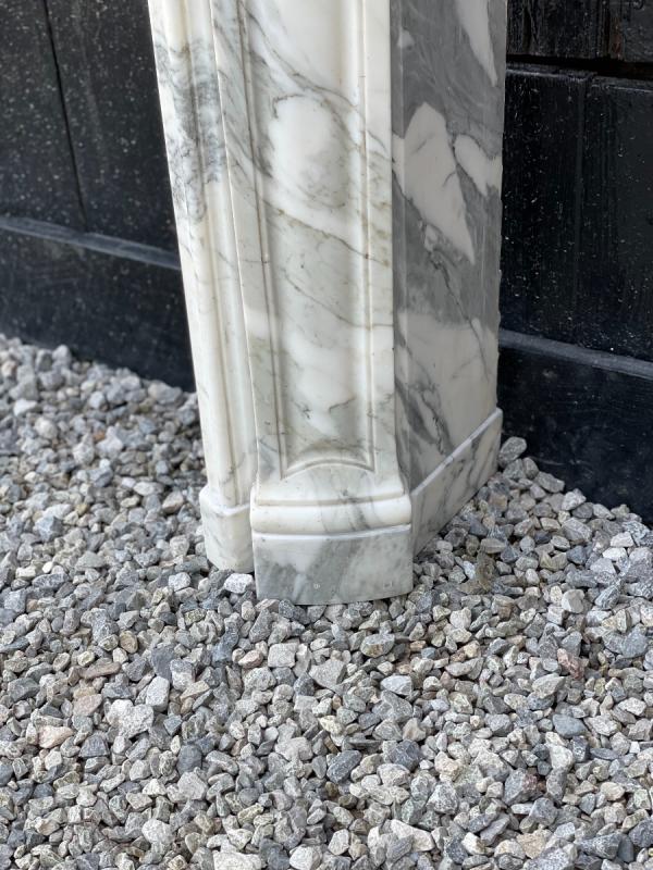 Louis XV style fireplace in white Carrara marble arabescato