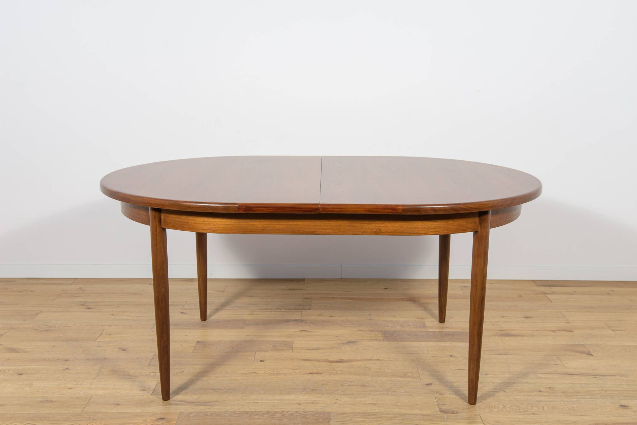Mid-Century Modern Oval Dining Table in Teak from G-Plan, United Kngdom.
