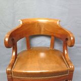 Fauteuil de bureau garni de cuir début XIXe siècle,
