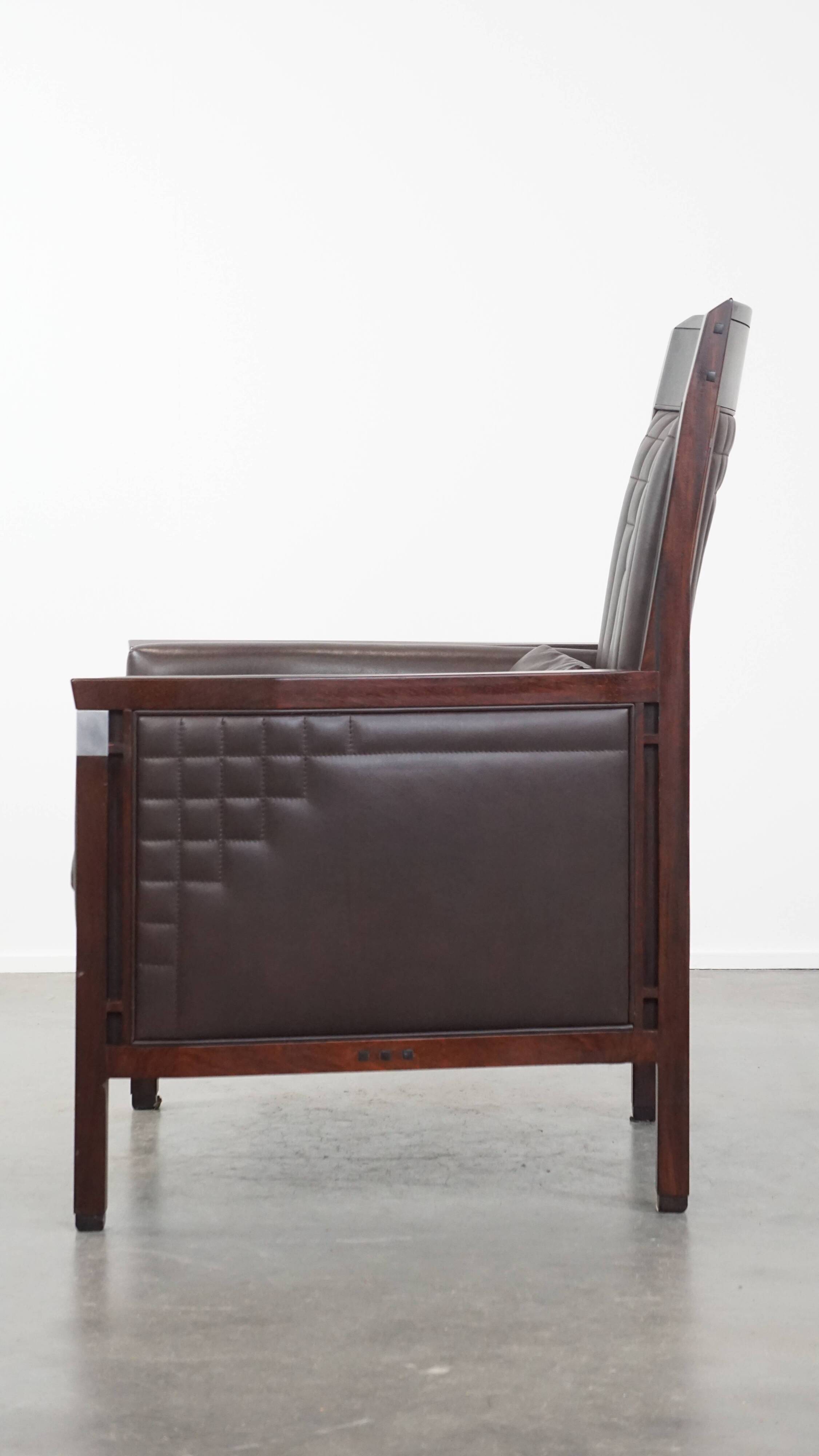 Art Deco armchair with dark brown leather