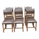 6 Henri II dining chairs in carved solid wood and brown leather from the 19th century.