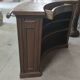 Walnut quarter-circle bar counter dating from the 50s/60s
