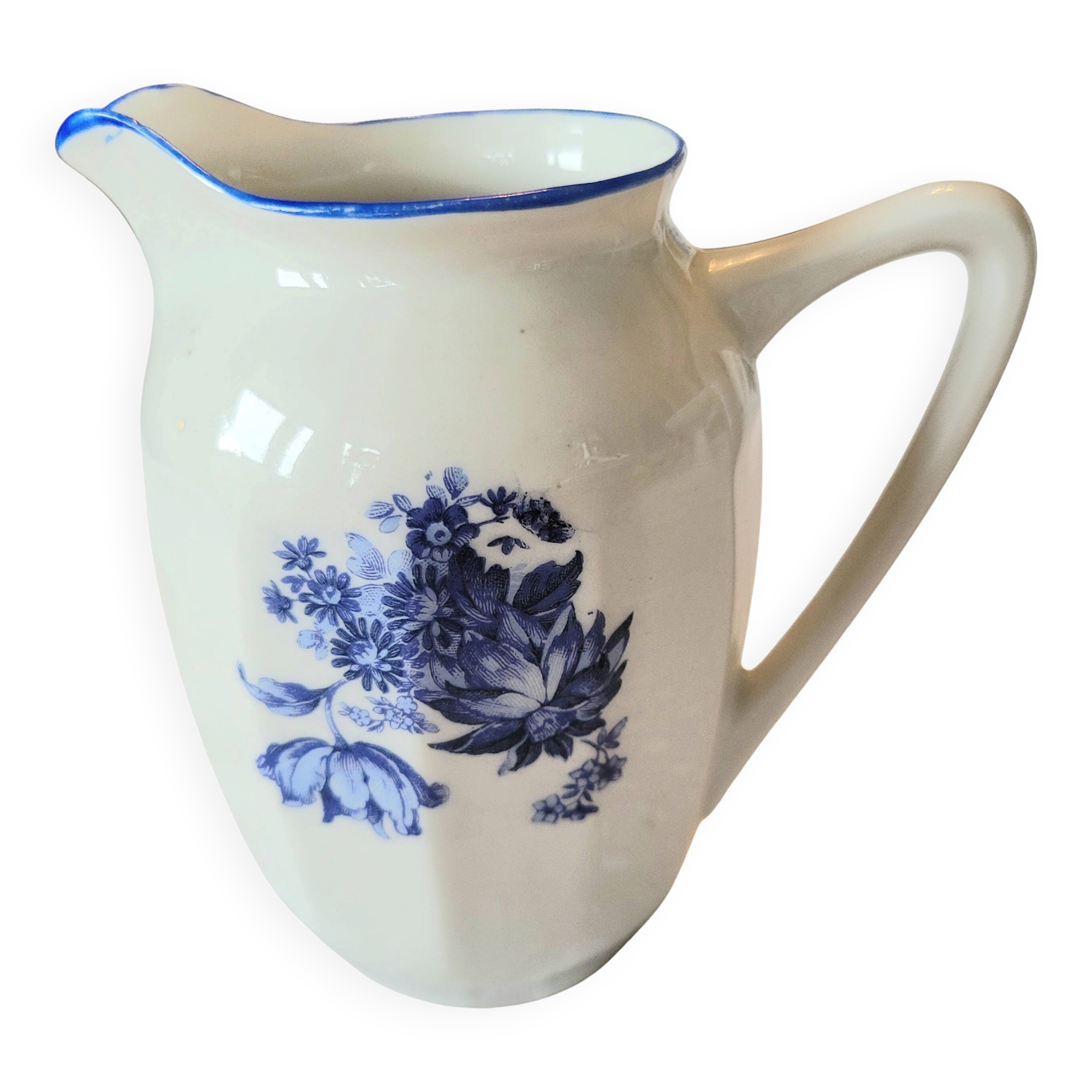 Vintage milk jug with blue and white floral pattern ceramic