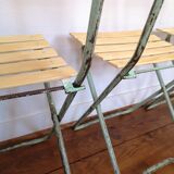 Set of 6 green folding chairs