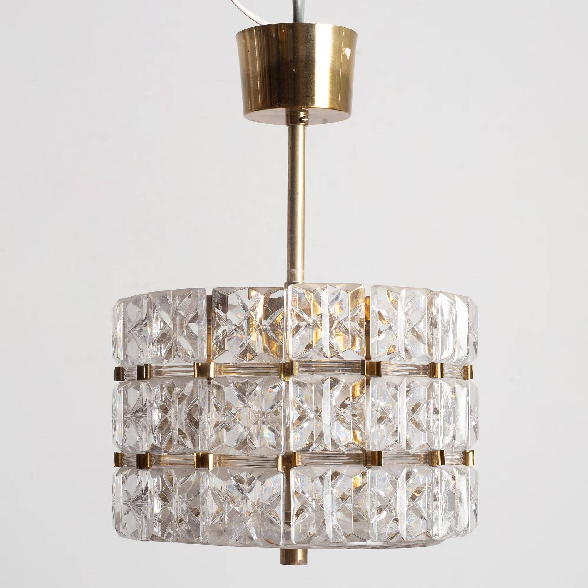 Suspended glass and brass lamp by Carl Fagerlund for Orrefors, Sweden, 1960.