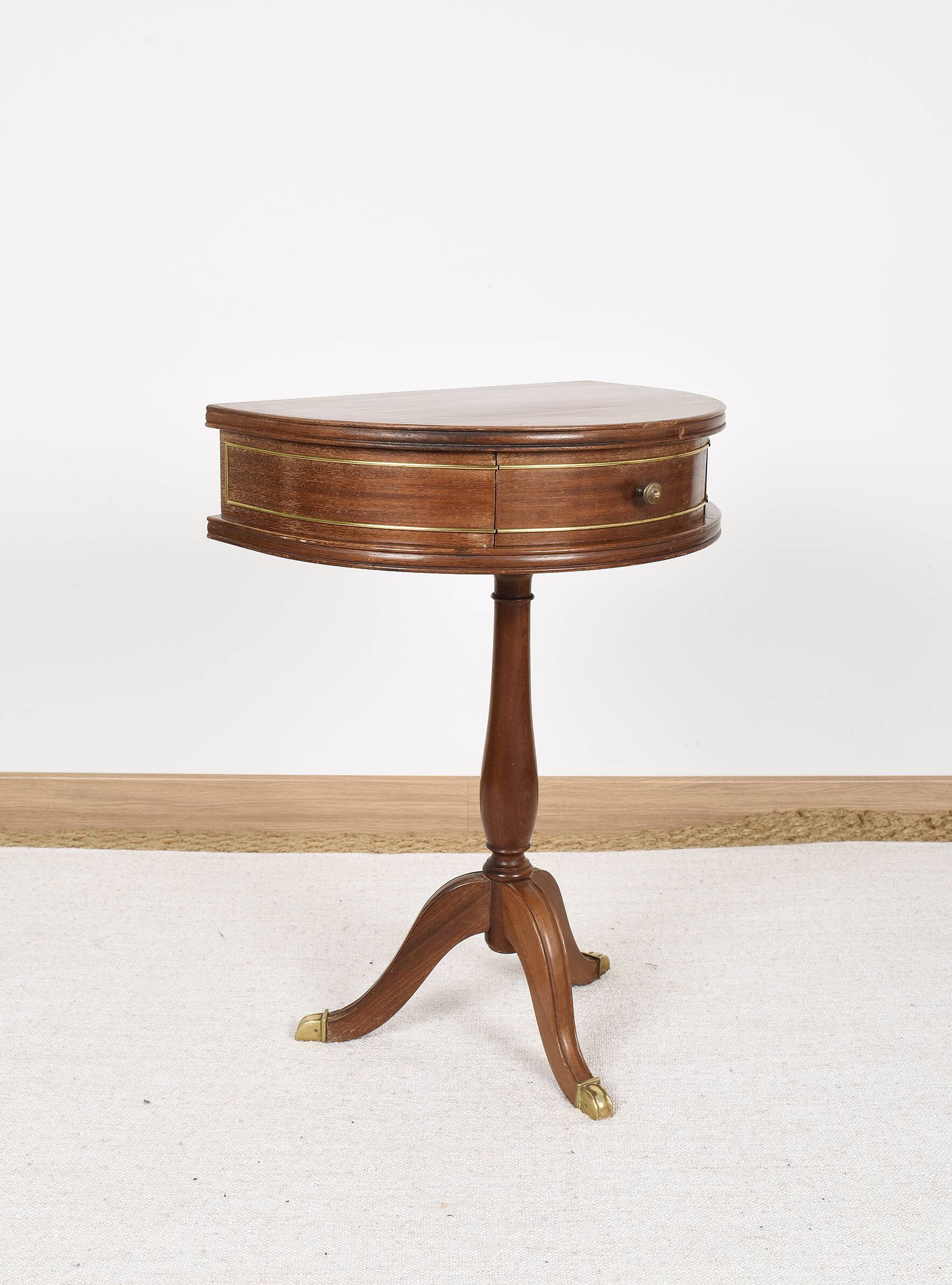 Pedestal table or small side table with drawer.