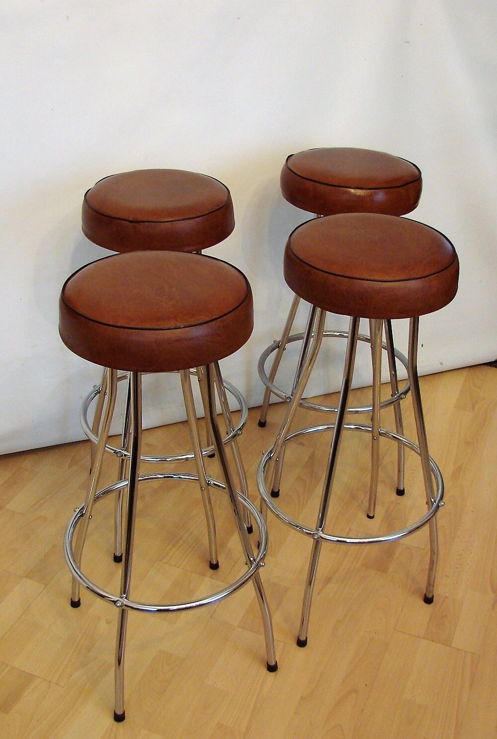 Pair of hockers, bar chairs 70s