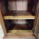 Antique wardrobe standing man