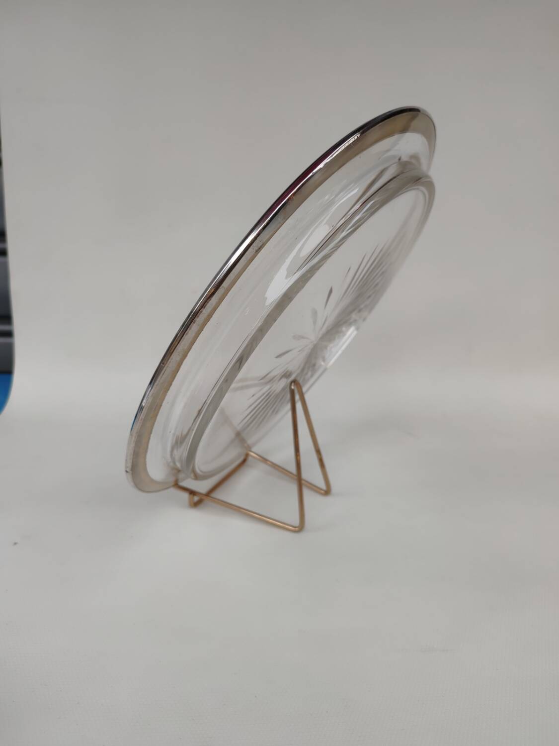 Cut crystal tray and solid silver rim.